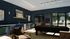 Chic entertainment room featuring a sleek pool table, comfortable seating, and elegant decor with large windows overlooking lush greenery.
