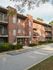 Lansdowne Towers apartment building with red brick and sculpted landscaping