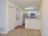 Dining area in front of the kitchen with a breakfast bar at Willow Ridge Apartments in Marlton, NJ.
