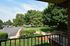 Balcony view of lush landscaping at Fairway Park apartments for rent in Wilmington, DE