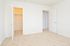 Carpeted bedroom with a large closet at Norriton East Apartments in East Norriton, PA.