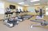 Fitness center with treadmills, stationary bicycles, and stepping machines at The Lafayette at Valley Forge apartments in King of Prussia, PA.