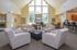 The Lafayette at Valley Forge Community Center with White Couches Around Black Table | King of Prussia Apartment Rentals