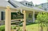 Landscaped entrance to the rental and management center at The Lafayette at Valley Forge apartments in King of Prussia, PA.