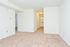 Carpeted living room at Willow Run Apartments in Willow Grove, PA.