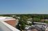 Rooftop patio with tree line views at Gilpin Place apartments for rent in Wilmington, DE