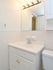 Bathroom with white vanity and mirror at Concord Court apartments for rent in Aston, PA