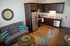 Open floor plan with kitchen and living space in downtown Kennett Square, PA apartment for rent