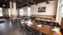Interior of Victory Brewing, and open bar and restaurant below Magnolia Place Apartments