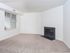 Living room with a fireplace at Fox Run apartments for rent in Warminster, PA