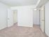 Bedroom with open closet and bedroom door at Fox Run apartments for rent in Warminster, PA