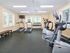 Berwyn, PA apartment complex fitness center with cardio machines and free weights