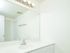 Bathroom with white vanity and mirror at Cedar Tree Village apartments for rent in Wilmington, DE