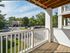 Private balcony with railing and view of the Glen Eagle Village Apartments community