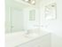 Model bathroom with large vanity sink at Oak Tree Apartments in Newark, DE.