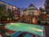 Swimming pool with lounge chairs and umbrellas at Waterloo Place Apartments in Baltimore, MD.