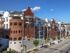 Brick exterior of Waterloo Place Apartments running along North Calvert Street in Baltimore, MD.
