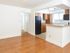 Kitchen and living room at City View apartments for rent in Lancaster, PA