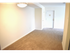 Model dining room with chandelier at Oak Tree Apartments in Newark, DE.