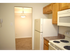 Model kitchen with modern appliances at Oak Tree Apartments in Newark, DE.