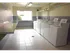On-site laundry facility with coin operated washers and dryers at Winslow House Apartments in Blackwood, NJ.