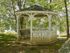 Gazebo with benches on the landscaped grounds at Victoria Crossing Apartments in Reading, PA.