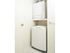 In-unit stacked washer and dryer at Woodland Plaza Apartments in Wyomissing, PA.