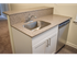 Breakfast bar with sink and dishwasher in the kitchen at Willow Ridge Apartments in Marlton, NJ.