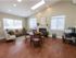 Interior of the leasing office furnished with seating areas at Wyntre Brooke apartments in West Chester, PA.