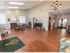 Interior of the leasing office furnished with seating areas at Wyntre Brooke apartments in West Chester, PA.
