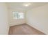 Carpeted bedroom at Mill Creek Village apartments in Langhorne, PA.