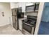 Kitchen with stainless steel appliances at Fox Run apartments for rent in Warminster, PA