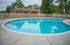 Community swimming pool and sun deck at Oak Forest Apartments in Reading, PA.