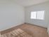 Bedroom with beige carpet and a window at Gayley Park apartments for rent in Media, PA