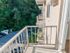 Balcony view of parking lot with neighbor balcony views at Gayley Park apartments for rent in Media, PA
