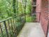 Serene forest view from Lansdowne Towers Apartments private balcony