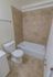 Bathroom with a bathtub and toilet at Black Hawk apartments for rent in Downingtown, PA