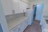 Kitchen with white appliances at Black Hawk apartments for rent in Downingtown, PA