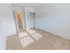 Carpeted bedroom with closet at Mayflower Crossing Apartments in Wilkes-Barre, PA.