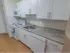 Contemporary kitchen with backsplash and white cabinets in West Chester, PA apartments for rent