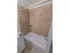 Tiled shower with white tub in apartment for rent in West Chester, PA