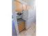 White microwave and fridge in apartment kitchen for rent in West Chester, PA