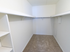 Walk-in closet with clothes rods and built-in shelves at The Lafayette at Valley Forge apartments in King of Prussia, PA.