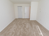 Carpeted bedroom with closet at The Lafayette at Valley Forge apartments in King of Prussia, PA.
