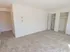 Carpeted bedroom with double closets at The Lafayette at Valley Forge apartments in King of Prussia, PA.