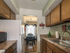 Kitchen with large sink and granite countertops in townhome for rent in Woodbury, NJ