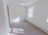 Dining room with two large windows and overhead lighting at Evergreen Club apartments for rent in Broomall, PA
