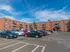 4-Story brick exterior of the apartments at Winslow House Apartments in Blackwood, NJ.