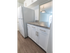 Model kitchen with a pass-through window to the dining area at Wyntre Brooke apartments in West Chester, PA.