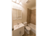 Model bathroom with vanity sink, toilet and tub shower at Wyntre Brooke apartments in West Chester, PA.